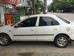 Mazda 323 2000 - Cần bán xe Mazda 323 sản xuất 2000, màu trắng