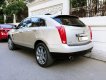 Cadillac SRX 2010 - Bán Cadillac SRX 2011 màu vàng Luxury