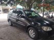 Kia Carnival   2007 - Cần bán Kia Carnival 2007, màu đen chính chủ, 235 triệu