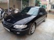 Mazda 626 2.0 MT 2003 - Bán Mazda 626 2.0 MT đời 2003, màu đen ít sử dụng