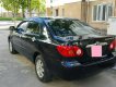 Toyota Corolla altis G 2004 - Gia đình bán ô tô Toyota Corolla altis G đời 2004, màu đen