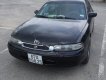 Mazda 626 1997 - Chính chủ bán xe Mazda 626 đời 1997, màu đen, nhập khẩu
