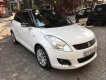 Suzuki Swift AT  2015 - Cần bán gấp Suzuki Swift AT sản xuất năm 2015, màu trắng số tự động