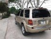 Ford Escape 3.0 V6 2002 - Bán ô tô Ford Escape 3.0 V6 đời 2002, màu vàng