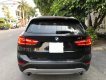 BMW X1 sDrive20i 2015 - Bán ô tô BMW X1 sDrive20i sản xuất 2015, màu đen, nhập khẩu nguyên chiếc