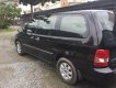 Kia Carnival 2006 - Bán Kia Carnival đời 2006, màu đen, nhập khẩu xe gia đình, giá tốt