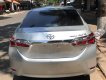 Toyota Corolla altis 1.8G 2014 - Cần bán xe Toyota Corolla altis 1.8G sản xuất 2014, màu bạc xe gia đình, giá chỉ 630 triệu