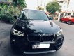 BMW X1 sDrive20i 2015 - Bán ô tô BMW X1 sDrive20i sản xuất 2015, màu đen, nhập khẩu nguyên chiếc