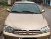 Kia Spectra   2004 - Cần bán lại xe Kia Spectra năm sản xuất 2004, màu vàng