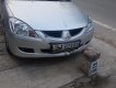 Mitsubishi Lancer 2004 - Cần bán xe Mitsubishi Lancer đời 2004, màu bạc, xe đi ít giữ gìn cẩn thận