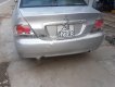 Mitsubishi Lancer 2004 - Cần bán xe Mitsubishi Lancer đời 2004, màu bạc, xe đi ít giữ gìn cẩn thận