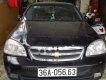 Daewoo Lacetti EX 2005 - Cần bán Daewoo Lacetti Ex đời 2005, màu đen, xe gia đình sử dụng nên rất giữ xe