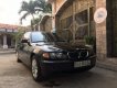 BMW 3 Series  318i   2004 - Cần bán BMW 318i sản xuất 2004, màu đen, số tự động