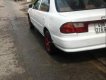 Mazda 323 1.6 MT 2001 - Bán xe Mazda 323 màu trắng, đời 2001, máy móc ổn