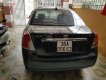 Daewoo Lacetti EX 2005 - Cần bán Daewoo Lacetti Ex đời 2005, màu đen, xe gia đình sử dụng nên rất giữ xe