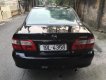 Mazda 626 2.0 MT 2003 - Bán Mazda 626 bản đủ nhất sx 2003, số tay, máy xăng, màu đen, hai túi khí phanh ABS