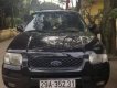 Ford Escape MT 2004 - Cần bán Ford Escape MT 2004, màu đen, xe đi giữ, chăm sóc tốt, gầm cao máy khỏe