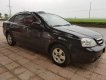 Chevrolet Lacetti EX 2010 - Bán Chevrolet Lacetti EX 2010, màu đen, xe gia đình 