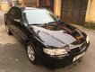 Mazda 626 2.0 MT 2003 - Bán Mazda 626 bản đủ nhất sx 2003, số tay, máy xăng, màu đen, hai túi khí phanh ABS