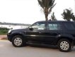 Ford Escape  XLS 2009 - Bán ô tô Ford Escape XLS năm 2009, màu đen xe gia đình