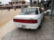 Mazda 323   1995 - Cần bán gấp Mazda 323 đời 1995, màu trắng, đèn trước sau mới thay, về chỉ việc đi