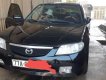 Mazda 323 2004 - Bán ô tô Mazda 323 sản xuất 2004, màu đen chính chủ, giá 145tr