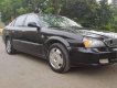 Daewoo Magnus 2006 - Bán ô tô Daewoo Magnus 2006, màu đen, nhập khẩu nguyên chiếc xe gia đình