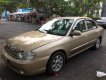 Kia Spectra 2004 - Cần bán Kia Spectra sản xuất năm 2004, màu vàng còn mới