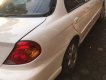 Kia Spectra MT 2004 - Cần bán Kia Spectra MT năm 2004, màu trắng, giá chỉ 105 triệu