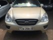 Kia Carens LX 2010 - Bán ô tô Kia Carens LX năm sản xuất 2010, màu vàng số sàn, giá 265tr