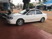 Kia Spectra 1.6 2004 - Bán Kia Spectra 1.6 đời 2004, màu trắng