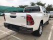 Toyota Hilux 2.4E 4x2 AT 2019 - Bán xe Toyota Hilux AT 2019, màu trắng, nhập khẩu, 695 triệu