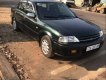 Ford Laser   2001 - Cần bán gấp Ford Laser 2001, màu đen, xe gia đình, 125tr