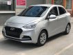 Hyundai Grand i10  1.2 MT Base 2018 - Cần bán lại xe Hyundai Grand i10 1.2 MT Base năm sản xuất 2018, màu bạc  