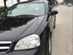 Daewoo Lacetti 1.6EX 2006 - Bán Daewoo Lacetti 1.6EX sản xuất 2006, màu đen, xe nhập