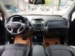 Hyundai Tucson 4WD 2011 - Cần bán xe Hyundai Tucson 4WD sản xuất 2011, màu đen, nhập khẩu nguyên chiếc, giá chỉ 585 triệu