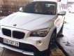 BMW X1 2010 - Cần bán xe BMW X1 2010, màu trắng xe gia đình