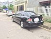 Mitsubishi Lancer 2005 - Cần bán Mitsubishi Lancer đời 2005, màu đen số tự động