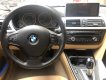 BMW 3 Series 320i 2012 - Bán xe BMW 3 Series 320i sản xuất 2012, màu đen, nhập khẩu còn mới 