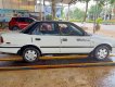 Toyota Corolla 1990 - Bán xe Toyota Corolla đời 1990, màu trắng, xe nhập xe gia đình 