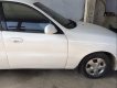 Daewoo Lanos   2003 - Cần bán gấp Daewoo Lanos năm sản xuất 2003, màu trắng, côn số ngọt ngào