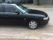 Mazda 626 1993 - Cần bán xe Mazda 626 đời 1993, màu đen