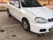 Daewoo Lanos SX 2002 - Cần bán xe Daewoo Lanos SX 2002, màu trắng, xe máy nổ êm