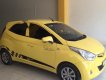 Hyundai Eon 2012 - Cần bán gấp Hyundai Eon đời 2012, màu vàng, nhập khẩu, Đk lần đầu 2014