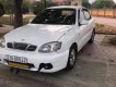 Daewoo Lanos SX 2002 - Cần bán xe Daewoo Lanos SX 2002, màu trắng, xe máy nổ êm