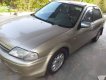 Ford Laser 2000 - Cần bán gấp Ford Laser đời 2000, màu vàng, nhập khẩu, 150tr