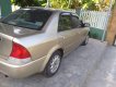 Ford Laser 2000 - Cần bán gấp Ford Laser đời 2000, màu vàng, nhập khẩu, 150tr