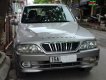 Ssangyong Musso 2.4AT 2004 - Cần bán Ssangyong Musso 2.4AT đời 2004, màu bạc giá cạnh tranh