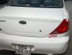 Kia Spectra 2004 - Cần bán gấp Kia Spectra năm sản xuất 2004, màu trắng