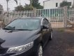 Kia Forte   2010 - Cần bán gấp Kia Forte đời 2010, màu đen, xe nhập, giá tốt